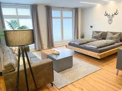 Ein Sitzbereich in der Unterkunft Appartement am Mythenweg