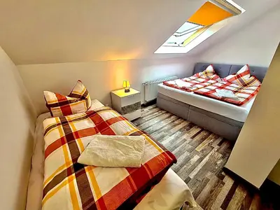 Ein Bett oder Betten in einem Zimmer der Unterkunft Ferien-Füchse Braunlage
