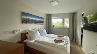 Ein Bett oder Betten in einem Zimmer der Unterkunft Malis-Ferienhaus