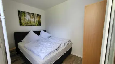Ein Bett oder Betten in einem Zimmer der Unterkunft Ferienwohnung Auenglück Hahnenklee Harz