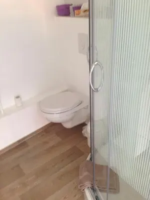 Ein Badezimmer in der Unterkunft Ferienhaus Brücke