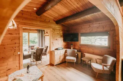 Ein Sitzbereich in der Unterkunft NEU! Komfort Ferienhaus Tannenrauschen