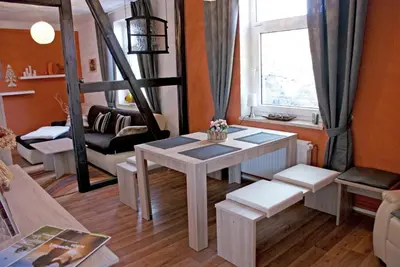 Ein Sitzbereich in der Unterkunft Ferienwohnung Midgard im Sagenharz - Family-Apartment, 2 SZ & WLAN