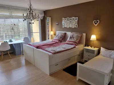 Ein Bett oder Betten in einem Zimmer der Unterkunft Ferienwohnung Traumhaft