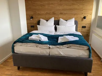 Ein Bett oder Betten in einem Zimmer der Unterkunft Schierker Harzbaude