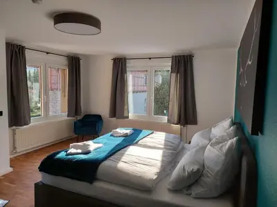 Ein Bett oder Betten in einem Zimmer der Unterkunft Schierker Harzbaude
