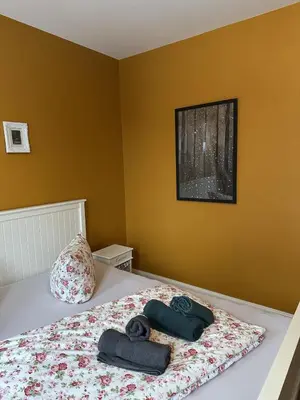 Ein Bett oder Betten in einem Zimmer der Unterkunft Unser Märchenhaus