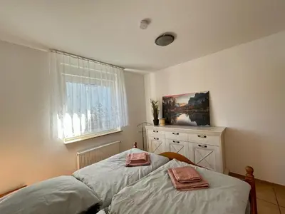 Ein Bett oder Betten in einem Zimmer der Unterkunft Ferienhaus Brockenpfad