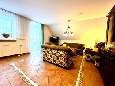 Ein Sitzbereich in der Unterkunft Ferienwohnung Gipfelglück mit Balkon
