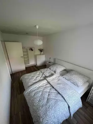 Ein Bett oder Betten in einem Zimmer der Unterkunft Wohnung Julie