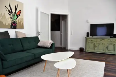 TV/Unterhaltungsangebot in der Unterkunft Ferienwohnung Villa Augusta-Bel Etage mit Infrarotkabine
