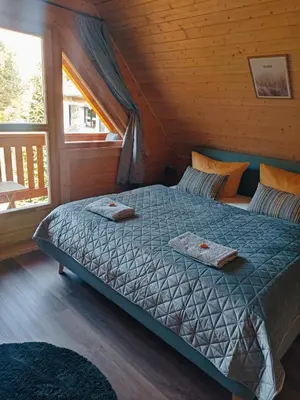 Ein Bett oder Betten in einem Zimmer der Unterkunft Ferienhaus Birkholz Harz
