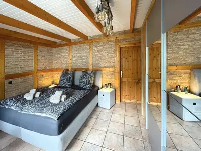 Ein Bett oder Betten in einem Zimmer der Unterkunft Ferienhaus Am Hang, Sky-Entertainment, DAZN, Carport, alles Barrierefrei
