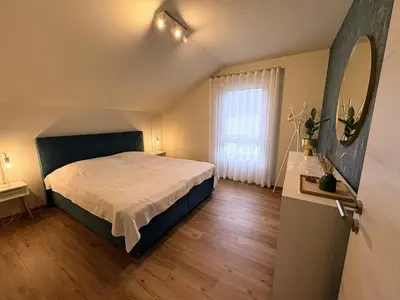 Ein Bett oder Betten in einem Zimmer der Unterkunft Ferienhaus Werna