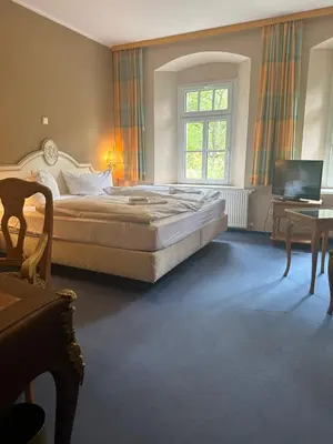 Ein Bett oder Betten in einem Zimmer der Unterkunft Hotel Bodeblick