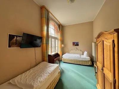Ein Bett oder Betten in einem Zimmer der Unterkunft Hotel Bodeblick