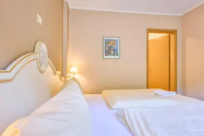 Ein Bett oder Betten in einem Zimmer der Unterkunft Hotel Bodeblick