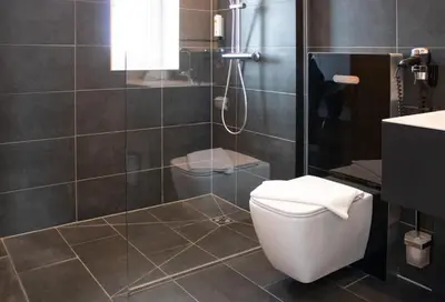 Ein Badezimmer in der Unterkunft HBS Hotel by WMM Hotels