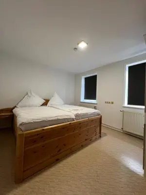 Ein Bett oder Betten in einem Zimmer der Unterkunft Ferienwohnung ENJOY 4