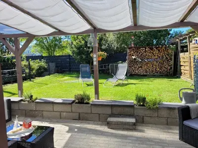 Ein Garten an der Unterkunft Ferienhaus kleine Remise