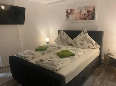 Ein Bett oder Betten in einem Zimmer der Unterkunft Silbertaler