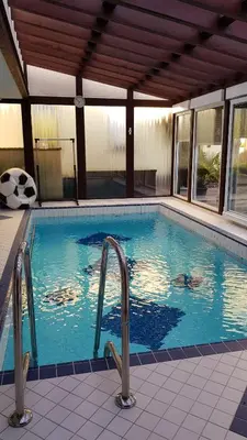 Der Swimmingpool an oder in der Nähe von ALACARD Ferienwohnungen Höffgen Thale Harz