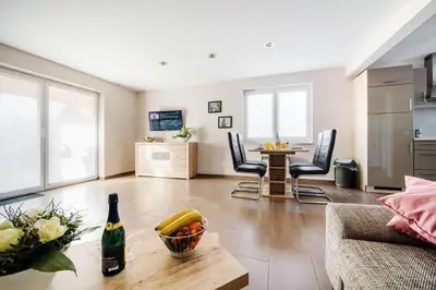 Ein Sitzbereich in der Unterkunft Ferienhaus Arisa I