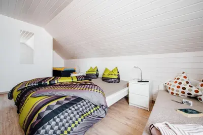 Ein Bett oder Betten in einem Zimmer der Unterkunft Ferienhaus Arisa I