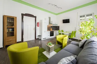 Ein Sitzbereich in der Unterkunft Ferienwohnung König
