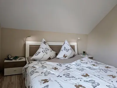 Ein Bett oder Betten in einem Zimmer der Unterkunft Ferienhaus Ostara