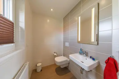 Ein Badezimmer in der Unterkunft Premiumferienhaus Lanai