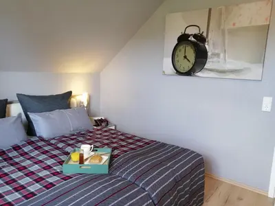 Ein Bett oder Betten in einem Zimmer der Unterkunft Premiumferienhäuser Agena & Ankaa
