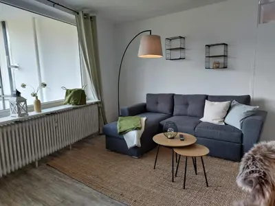 Ein Sitzbereich in der Unterkunft Ferienwohnung Schloepe god
