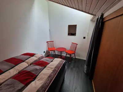 Ein Bett oder Betten in einem Zimmer der Unterkunft gemütliche moderne Ferienwohnung inkl. WLAN in St Andreasberg/Braunlange