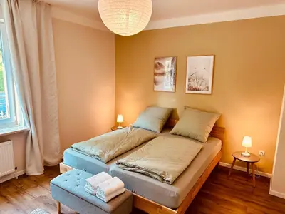 Ein Bett oder Betten in einem Zimmer der Unterkunft Ferienwohnung Kaiserglück