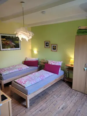 Ein Bett oder Betten in einem Zimmer der Unterkunft Ferienwohnung Leon