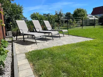 Ein Garten an der Unterkunft Stilapartment Oasis 1 #Whirlpool saisonal