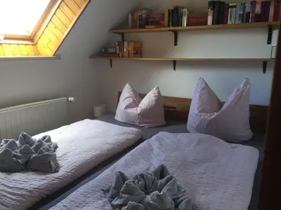 Ein Bett oder Betten in einem Zimmer der Unterkunft Ferienhaus Geiserich