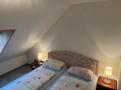 Ein Bett oder Betten in einem Zimmer der Unterkunft Haus Dulshorn Braunlage