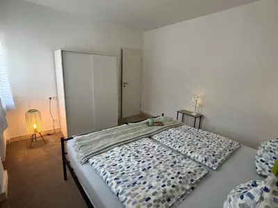 Ein Bett oder Betten in einem Zimmer der Unterkunft Exklusive Ferienwohnung mit 3 Schlafzimmern und 2 Bädern!