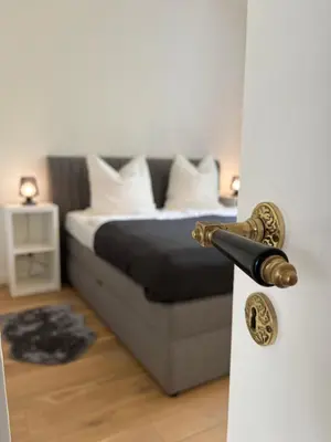 Ein Bett oder Betten in einem Zimmer der Unterkunft Prinzenhof Suite