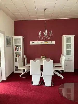 Ein Sitzbereich in der Unterkunft Villa Rosengarten