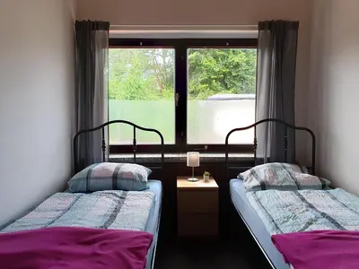 Ein Bett oder Betten in einem Zimmer der Unterkunft Ferienwohnung Stiege