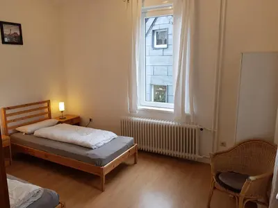 Ein Bett oder Betten in einem Zimmer der Unterkunft Haus Bergeshöh