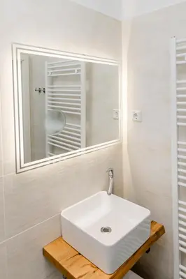 Ein Badezimmer in der Unterkunft Aneton Garni Hotel