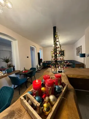 Ein Sitzbereich in der Unterkunft Aneton Garni Hotel