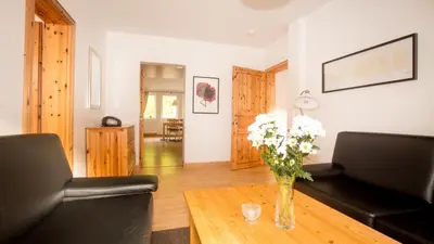 Ein Sitzbereich in der Unterkunft Ferienwohnung Forsthaus am Brocken, 80 qm, 3 Schlafzimmer F6