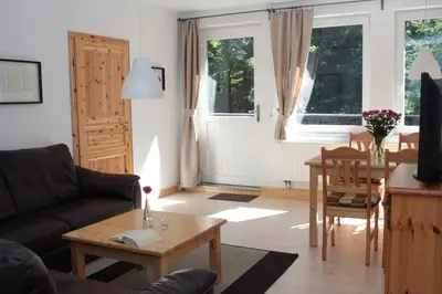 Ein Sitzbereich in der Unterkunft Ferienwohnung Forsthaus am Brocken, 55 qm, 2 Schlafzimmer F7
