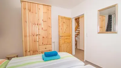 Ein Bett oder Betten in einem Zimmer der Unterkunft Ferienhäuser Ilsestein Einzelhaus, 130 qm, 4 Schlafzimmer