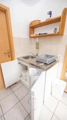 Küche/Küchenzeile in der Unterkunft Ferienwohnung Nexö, 30 qm, 1 Schlafzimmer N4